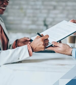 Woman signing document